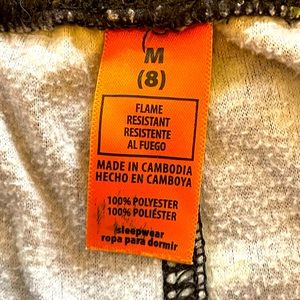 Brand new Halloween themed 100% polyester PJ bottom pants, Size 8.